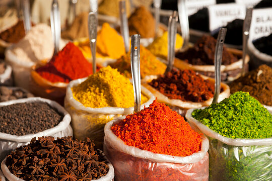 Bags of coloured spices at Anjuna market in Goa